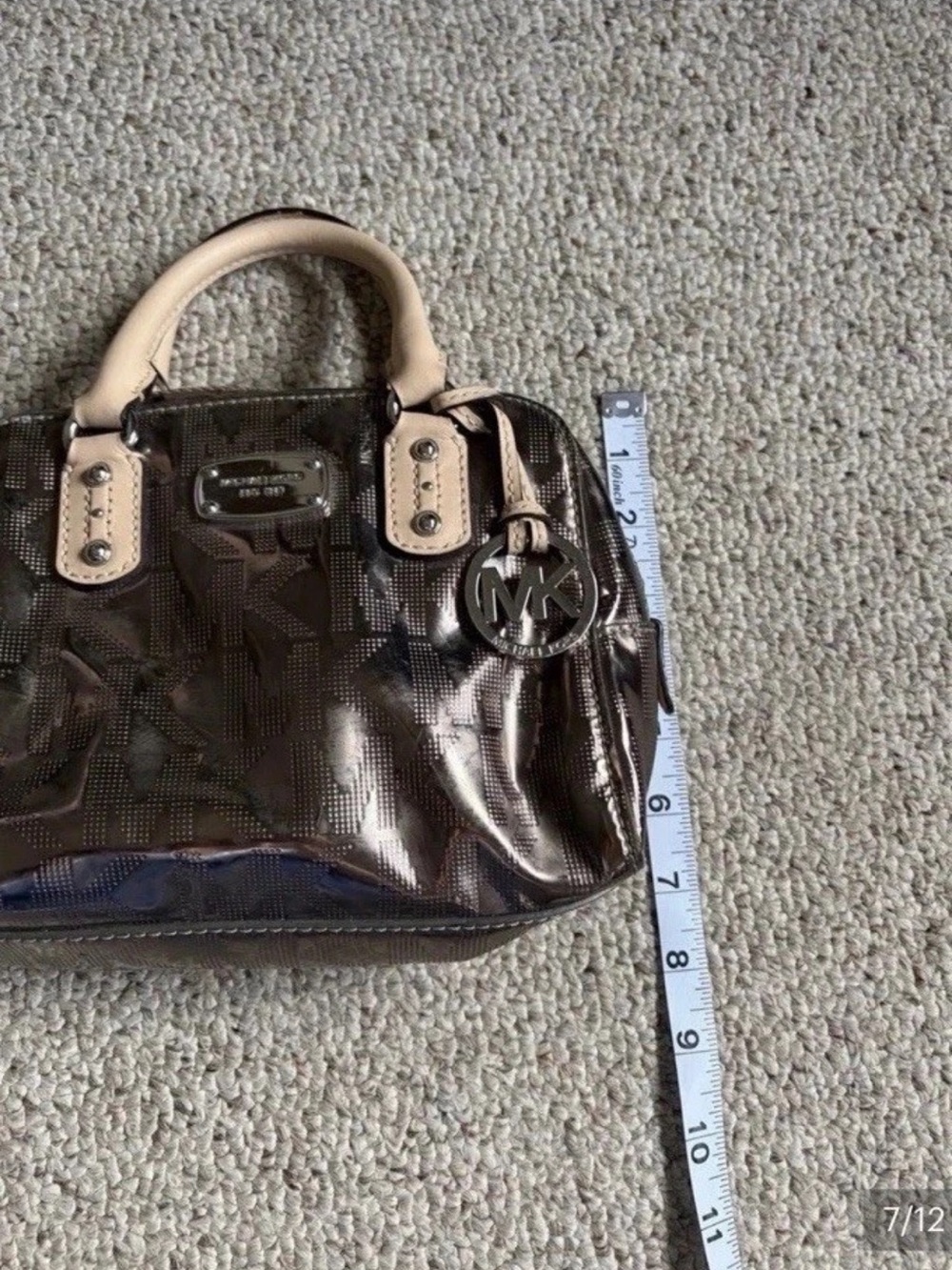 Michael Kors Metallic Silver Mini
Satchel w/Monogram MK Charm - Picture 6 of 10